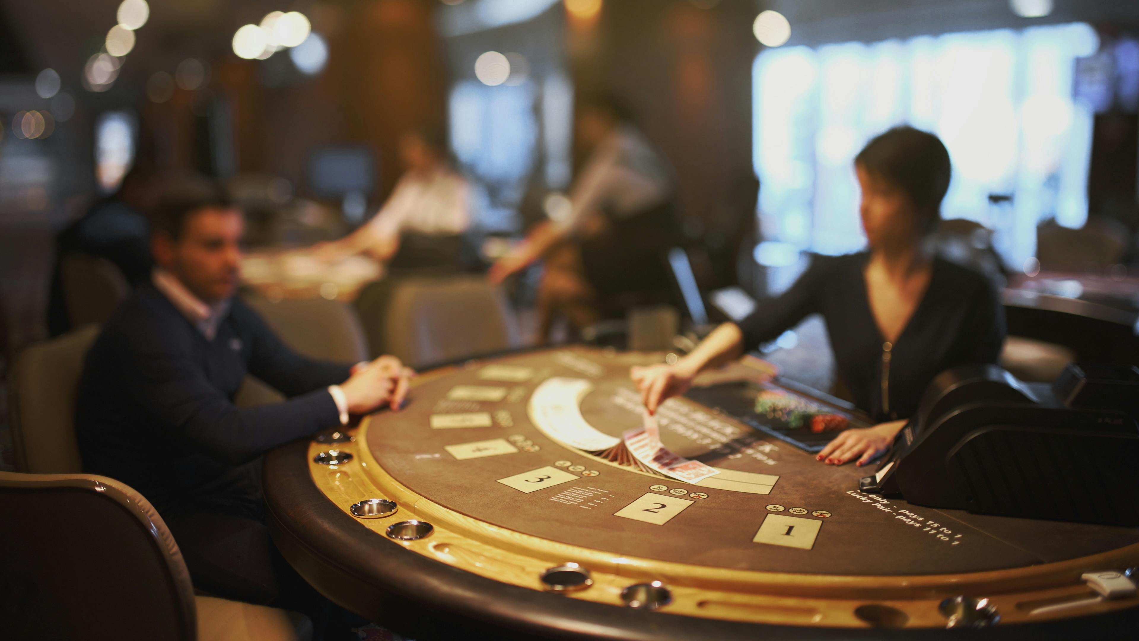 royalbet88 live-dealer studio with blackjack table, professional dealers, and HD broadcast cameras
